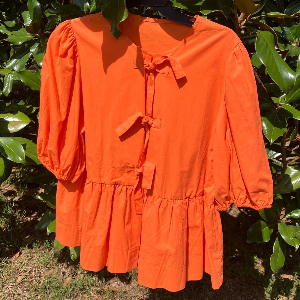 NEW Orange peplum top